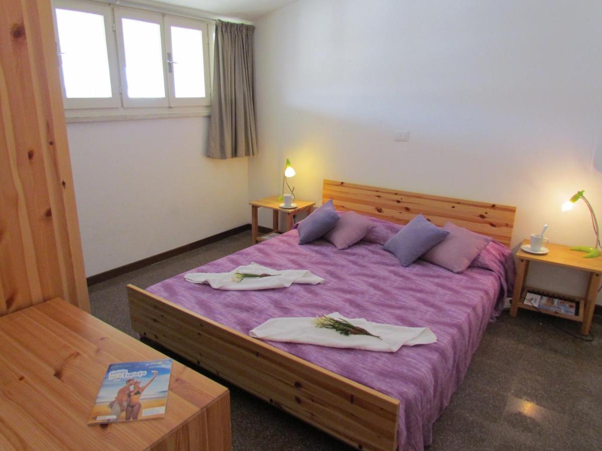 Colorful Attic With Large Terrace - Beahost Apartment Бибионе Екстериор снимка